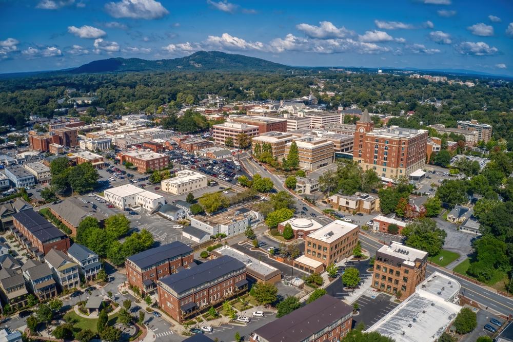 Aerial view of downtown Marietta, Georgia, with Kennesaw Mountain in the distance
