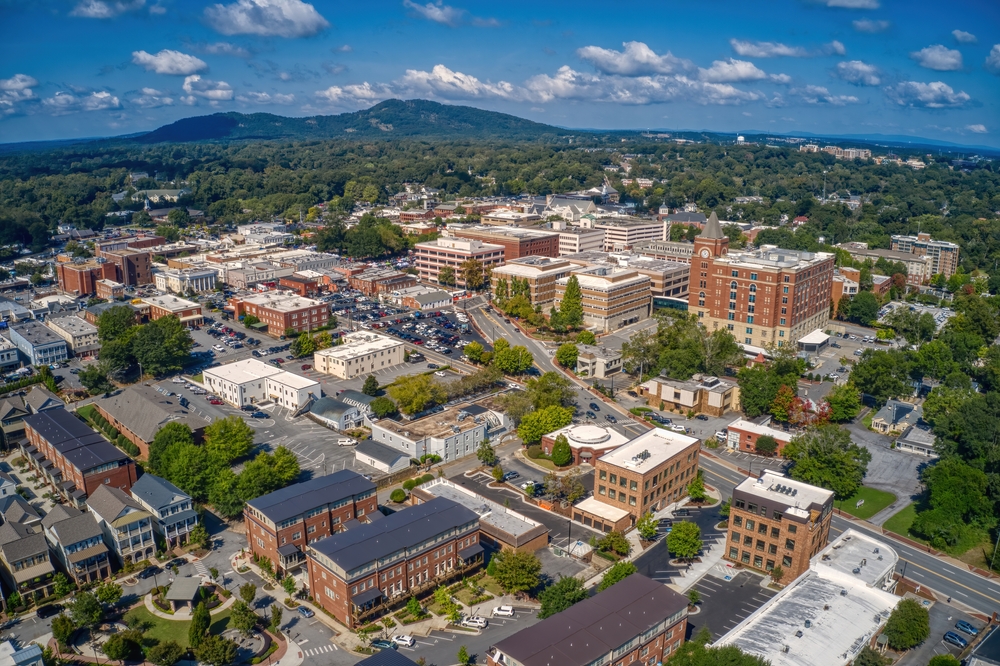 Aerial view of downtown Marietta, Georgia, with Kennesaw Mountain in the distance